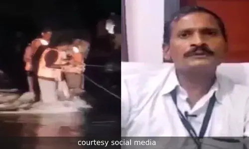 थरारक : पुरात अडकलेल्या दोघांचे उपजिल्हाधिकाऱ्यांनी वाचविले प्राण थरारक : पुरात अडकलेल्या दोघांचे उपजिल्हाधिकाऱ्यांनी वाचविले प्राण